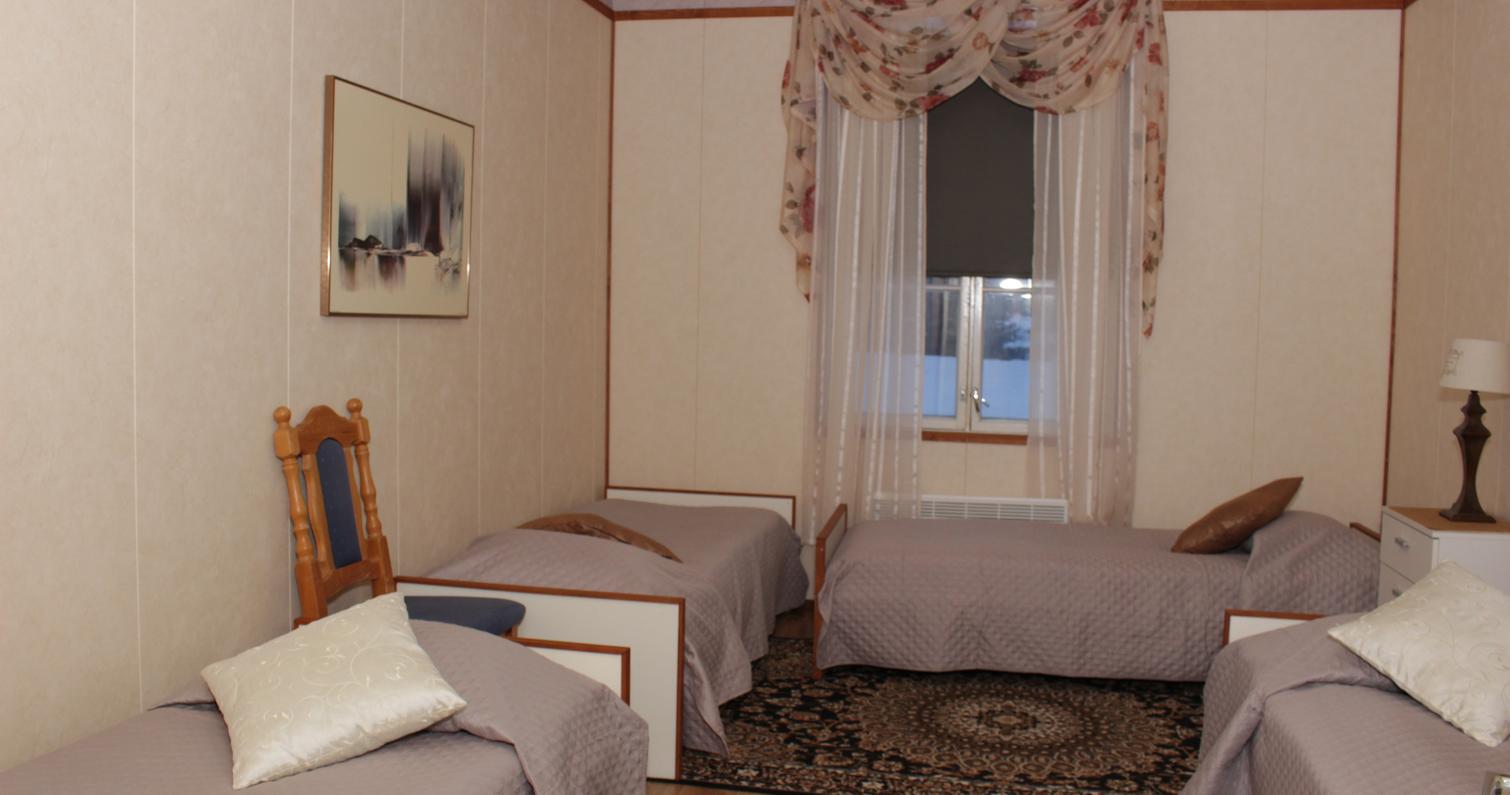 Suma-huoneiston makuuhuone